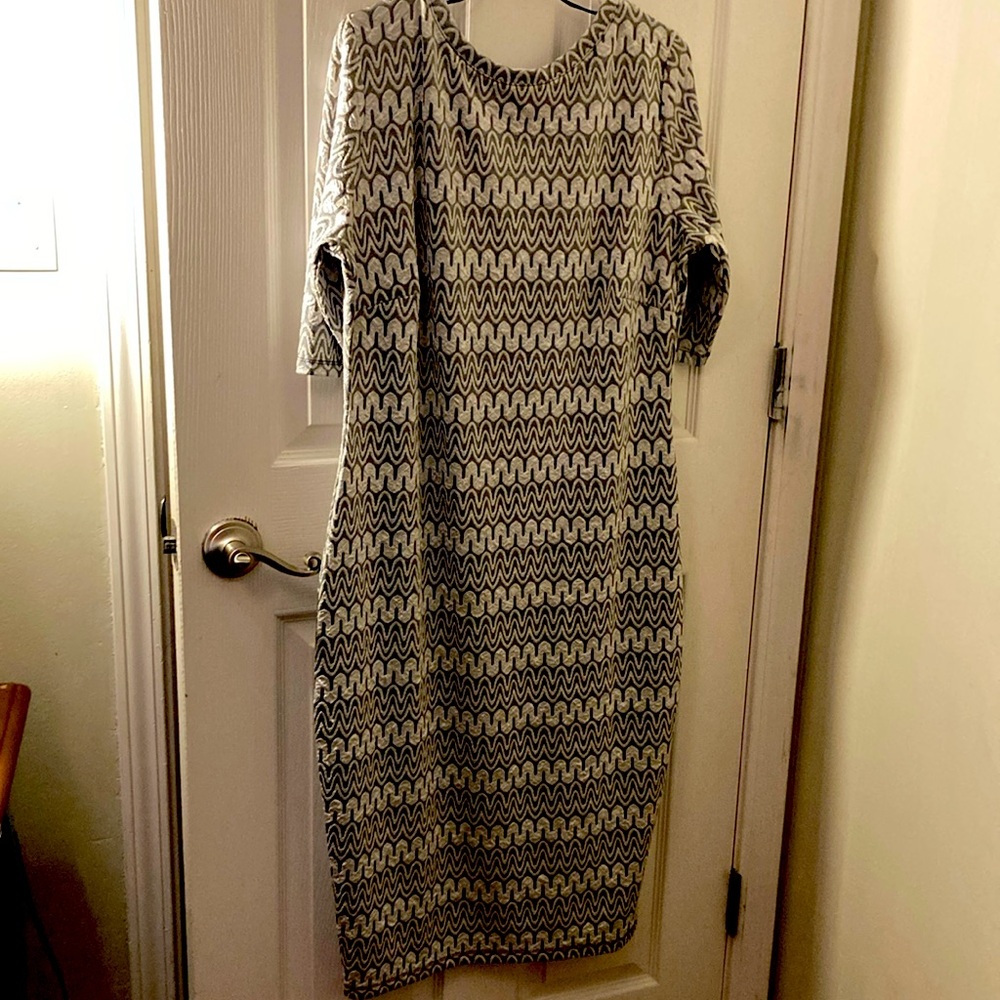 2x dress and a grayish green color new with tag